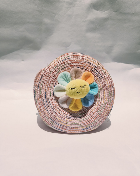 Handwoven Rainbow Sling Bag with Plush Flower – Crafted by Rural Artisans